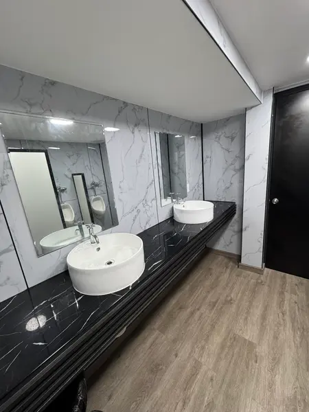 Remodelación de Baños — Servicio Nacional de Migración
